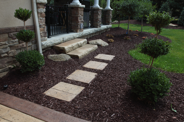 Concrete Stepping Stone Through Mulch Bed